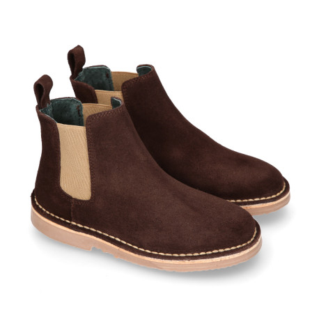 Kids ankle boots with elastic band in suede leather in BROWN color.