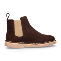 Kids ankle boots with elastic band in suede leather in BROWN color.