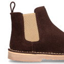 Kids ankle boots with elastic band in suede leather in BROWN color.