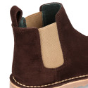 Kids ankle boots with elastic band in suede leather in BROWN color.