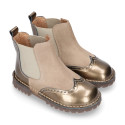 Combined leather kids ankle boots with elastic band and thick outsole.