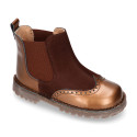 Combined leather kids ankle boots with elastic band and thick outsole.