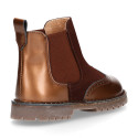 Combined leather kids ankle boots with elastic band and thick outsole.