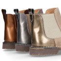 Combined leather kids ankle boots with elastic band and thick outsole.