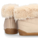 Kids Bootie BLANDITOS shoes with faux fur neck design and with side zipper closure.