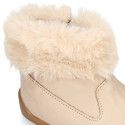 Kids Bootie BLANDITOS shoes with faux fur neck design and with side zipper closure.