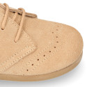Kids laces up shoes with laces closure and chopped design in suede leather.