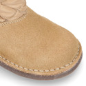 Suede leather Kids Boots Australian style combined with Nylon and fake hair lining.