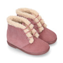 Classic kids suede leather little bootie with FAKE HAIR design.