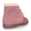 Classic kids suede leather little bootie with FAKE HAIR design.