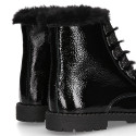 ROCK style BLACK patent finish girl boots with fake hair design.