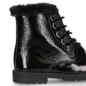 ROCK style BLACK patent finish girl boots with fake hair design.