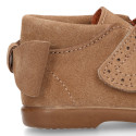 Girl Suede leather little bootie laceless with bow and chopped design.