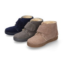 Suede leather little bootie sneaker style with fake hair lining and laceless in fall colors.