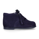 Suede leather Welsh or English style ankle boots with tassels.