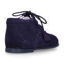 Suede leather Welsh or English style ankle boots with tassels.