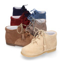 Suede leather Welsh or English style ankle boots with tassels.