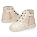 ROCK style BEIGE patent leather girl boots with metal ties closure.