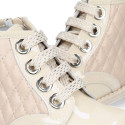 ROCK style BEIGE patent leather girl boots with metal ties closure.