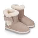 Suede leather Australian style Boot shoes with FUR and RIBBON design.