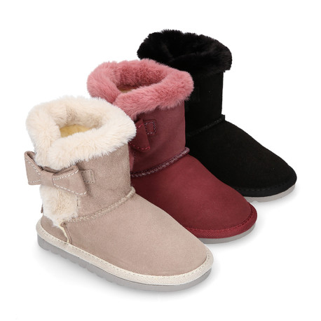 Suede leather Australian style Boot shoes with FUR and RIBBON design.