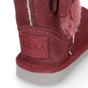 Suede leather Australian style Boot shoes with FUR and RIBBON design.