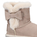 Suede leather Australian style Boot shoes with FUR and RIBBON design.