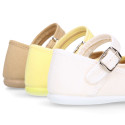 Stylized Cotton Canvas Merceditas or Mary Jane style shoes with buckle fastening.