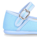 Stylized Cotton Canvas Merceditas or Mary Jane style shoes with buckle fastening.