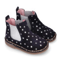 Suede leather ankle boot shoes with stars print design.