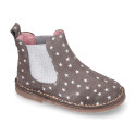 Suede leather ankle boot shoes with stars print design.