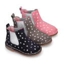 Suede leather ankle boot shoes with stars print design.