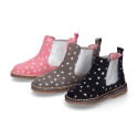 Suede leather ankle boot shoes with stars print design.