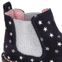 Suede leather ankle boot shoes with stars print design.