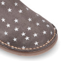 Suede leather ankle boot shoes with stars print design.