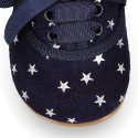 Suede leather laces up shoes with stars print design.