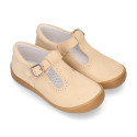 Classic suede leather T-strap shoes with toe cap and buckle fastening.