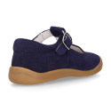 Classic suede leather T-strap shoes with toe cap and buckle fastening.