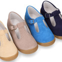 Classic suede leather T-strap shoes with toe cap and buckle fastening.