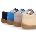 Classic suede leather T-strap shoes with toe cap and buckle fastening.