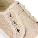 Cotton laces canvas bambas type shoes with ties closure and toe cap.