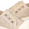 Cotton laces canvas bambas type shoes with ties closure and toe cap.
