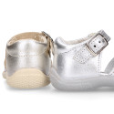 Metal finish leather sandals with buckle fastening and super flexible soles for little girls.