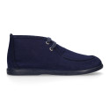 Cotton canvas Wallabee style bootie shoes with ties closure.