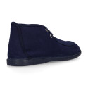 Cotton canvas Wallabee style bootie shoes with ties closure.