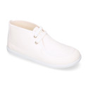 Cotton canvas Wallabee style bootie shoes with ties closure.