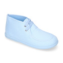 Cotton canvas Wallabee style bootie shoes with ties closure.