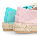 New soft cotton canvas laces up espadrille shoes.