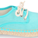 New soft cotton canvas laces up espadrille shoes.