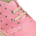 Classic Safari boots with laces and Stars print in Suede leather.